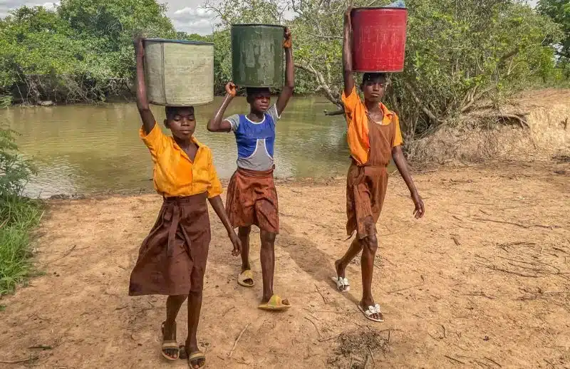 Girls with tub on their head